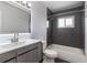 Contemporary bathroom featuring a sleek vanity, modern fixtures, and a tiled shower-tub combination at 321 Shore E Dr, Oldsmar, FL 34677