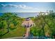 Scenic park view showcasing a waterfront gazebo and well-maintained landscape on a sunny day at 321 Shore E Dr, Oldsmar, FL 34677