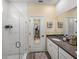 Contemporary bathroom featuring a glass shower and a modern sink at 34135 White Fountain Ct, Wesley Chapel, FL 33545