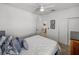 Bright bedroom with a comfortable bed, closet, and stylish decor, creating a serene and inviting atmosphere at 34135 White Fountain Ct, Wesley Chapel, FL 33545