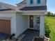 Charming front porch with seating and a 