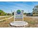 Highland Lakes community sign for active adults, featuring pool, tennis and golf at 3957 Tarpon Pointe Cir, Palm Harbor, FL 34684