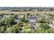 An aerial view captures several neighborhood homes, showcasing the proximity to city buildings in the background at 401 N Manhattan Ave, Tampa, FL 33609