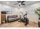 Bonus room featuring modern exercise equipment, a ceiling fan, and lots of natural light at 401 N Manhattan Ave, Tampa, FL 33609