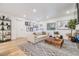 Open concept living room with light floors, stylish decor, and plenty of natural light at 401 N Manhattan Ave, Tampa, FL 33609