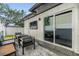 Step out onto this cozy patio with a TV, outdoor seating, and a seamless transition to indoor-outdoor living at 401 N Manhattan Ave, Tampa, FL 33609