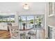 Bright dining area that has sliding door access to backyard with views of canal at 4204 Saltwater Blvd, Tampa, FL 33615