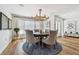 Bright dining space with round table, stylish chairs, and large window at 4204 Saltwater Blvd, Tampa, FL 33615