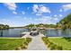 Beautiful waterfront home with private dock and boat lift, perfect for enjoying boating and outdoor activities at 4204 Saltwater Blvd, Tampa, FL 33615