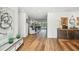Spacious foyer with hardwood floors leading to a bright living area and water views at 4204 Saltwater Blvd, Tampa, FL 33615