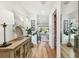 Inviting hallway with hardwood floors, elegant decor, and plenty of natural light, creating a warm atmosphere at 4204 Saltwater Blvd, Tampa, FL 33615