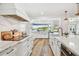 Beautiful open kitchen with island and a view of the water at 4204 Saltwater Blvd, Tampa, FL 33615