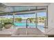 The kitchen sink overlooks the pool, river, and outdoor area at 4204 Saltwater Blvd, Tampa, FL 33615