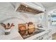 Modern kitchen with stainless steel range hood and marble countertops at 4204 Saltwater Blvd, Tampa, FL 33615