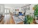 Bright living room features hardwood floors, modern decor and picture frame art at 4204 Saltwater Blvd, Tampa, FL 33615