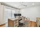 Modern home office with a ceiling fan, large window, and lots of natural light, perfect for working from home at 4204 Saltwater Blvd, Tampa, FL 33615