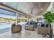 Outdoor living space with comfortable seating and clear views of the canal at 4204 Saltwater Blvd, Tampa, FL 33615