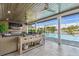 Outdoor living space with comfortable seating and clear views of the pool at 4204 Saltwater Blvd, Tampa, FL 33615