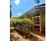 A property featuring an outdoor patio with yard and foliage, creating a relaxing atmosphere at 4485 49Th N Ave, St Petersburg, FL 33714
