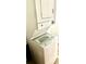Space-saving stackable washer and dryer laundry setup, maximizing efficiency in the home at 4485 49Th N Ave, St Petersburg, FL 33714