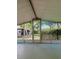 The screened patio provides a view of the yard and foliage, ideal for relaxing or entertaining at 4485 49Th N Ave, St Petersburg, FL 33714