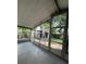 A screened patio offers serene views of the lush backyard, bringing the outdoors in at 4485 49Th N Ave, St Petersburg, FL 33714