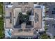Overhead shot showcases the building's unique design, featuring a central courtyard and rooftop amenities at 500 N Osceola Ave # 609, Clearwater, FL 33755