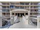 Welcoming entrance to 500 North Osceola Ave with well-maintained landscaping and architectural detail at 500 N Osceola Ave # 609, Clearwater, FL 33755