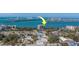 Waterfront condo building surrounded by cityscapes, bridges, and highways in a coastal town at 500 N Osceola Ave # 609, Clearwater, FL 33755
