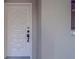 Stylish front door with decorative details and a dark handle at 500 N Osceola Ave # 609, Clearwater, FL 33755