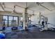 On-site gym with treadmills, ellipticals, and free weights overlooking a bay at 500 N Osceola Ave # 609, Clearwater, FL 33755