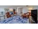 Bright living room with comfortable seating, glass table, and plenty of space to relax and entertain at 500 N Osceola Ave # 609, Clearwater, FL 33755