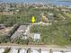 Aerial community view highlighting residences, landscaping, and community pool at 5104 2Nd E Ave, Palmetto, FL 34221