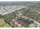 An aerial view of this quiet neighborhood shows mature trees, a pond and easy access to shopping at 5104 2Nd E Ave, Palmetto, FL 34221