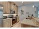 Well-equipped kitchen with stainless steel appliances, granite countertops, and modern cabinetry at 5104 2Nd E Ave, Palmetto, FL 34221