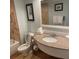 Bathroom with granite vanity, toilet, and shower/tub combo with tile surround at 5500 Gulf Blvd # 4246, St Pete Beach, FL 33706