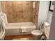 Compact bathroom design with tub-shower combo and a toilet at 5500 Gulf Blvd # 4246, St Pete Beach, FL 33706