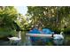 Tranquil community waterways featuring Gathering-friendly pedal boats and graceful swans at 5500 Gulf Blvd # 4246, St Pete Beach, FL 33706