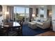Comfortable living room featuring a sofa and a dining area with a view at 5500 Gulf Blvd # 4246, St Pete Beach, FL 33706
