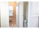 Bright bathroom featuring elegant finishes, a charming window seat, and a separate water closet for added privacy at 601 Gay Rd, Seffner, FL 33584