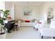Bright living room with white furniture, a piano, and tile floors at 601 Gay Rd, Seffner, FL 33584