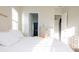 Airy main bedroom with light-colored walls, a dresser, and bright windows at 601 Gay Rd, Seffner, FL 33584