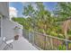 This cozy balcony has a lovely wooded view at 618 Wheaton Trent Pl, Tampa, FL 33619
