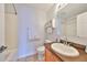 Bathroom with updated vanity and neutral tile flooring at 618 Wheaton Trent Pl, Tampa, FL 33619