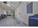 Spacious garage providing ample parking and storage with utility sink at 618 Wheaton Trent Pl, Tampa, FL 33619