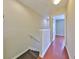 Hallway with wood floors leading to a bedroom at 618 Wheaton Trent Pl, Tampa, FL 33619