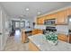 The kitchen offers a breakfast bar and stainless appliances at 618 Wheaton Trent Pl, Tampa, FL 33619