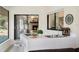 Indoor bar area with a view of the stone fireplace in the living room at 6213 S Queensway Dr, Temple Terrace, FL 33617