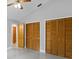 Bedroom featuring lots of closet space and a ceiling fan at 6213 S Queensway Dr, Temple Terrace, FL 33617