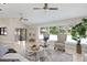 Spacious living room with plenty of natural light, vaulted ceilings, and neutral tones at 6213 S Queensway Dr, Temple Terrace, FL 33617